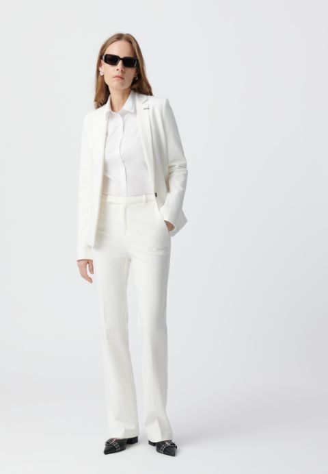 Women’s white Milano knit flared suit trousers